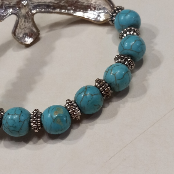 Gypsy Jewels Simulated Turquoise Sideways Silvertone Cross Stretch Bracelet - Picture 5 of 6